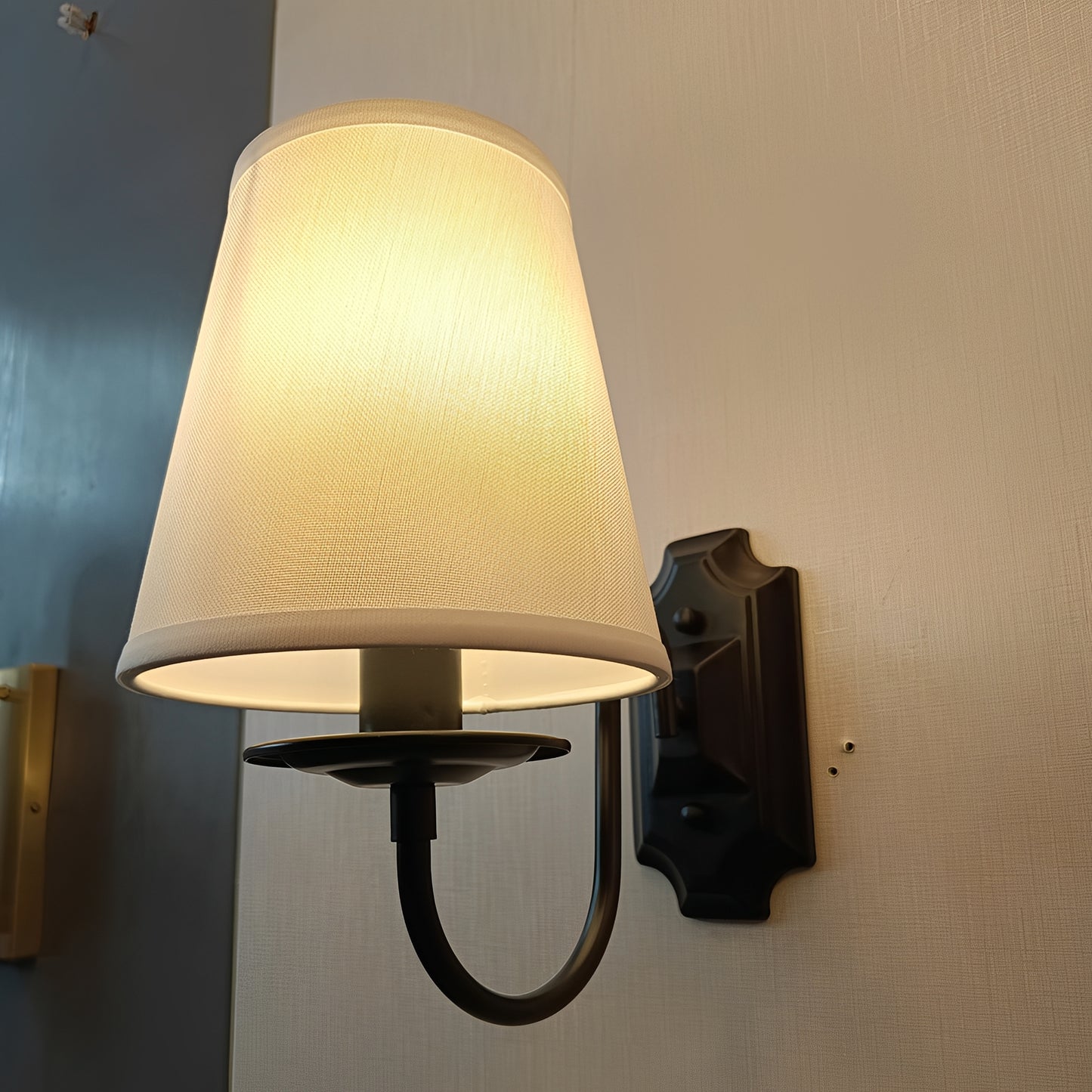 Harper – Schmiedeeiserne Wandlampe
